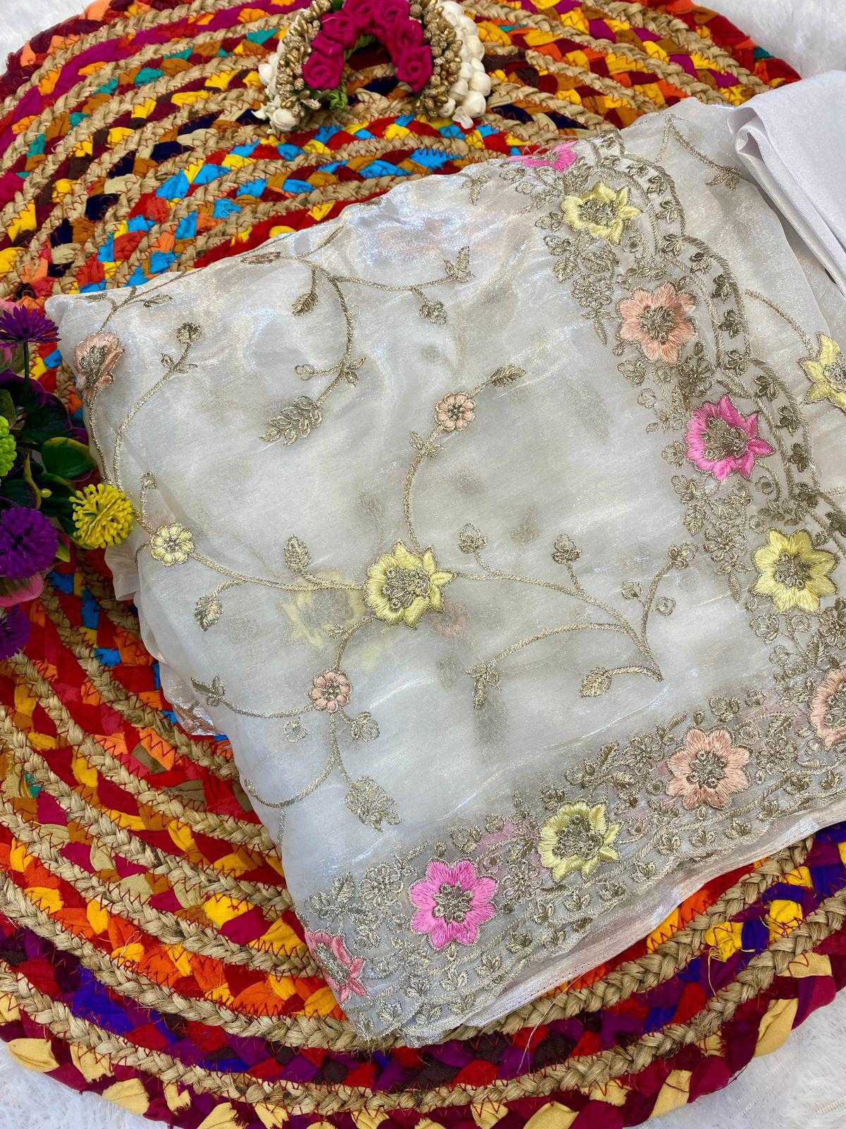 jimmyChoo fabric delicately crafted with multicolored thread and zaridori embroidery in floral motifs