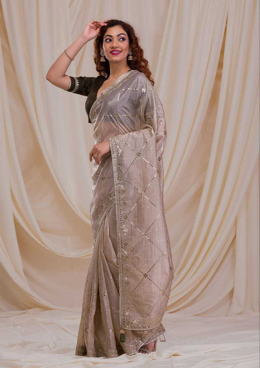 Beige Jimmy Choo Saree With Zari Embroidery Lace Border and Blouse