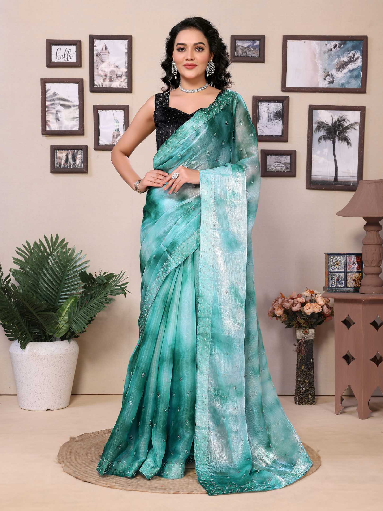 Sea green jimmy choo saree with diamond work